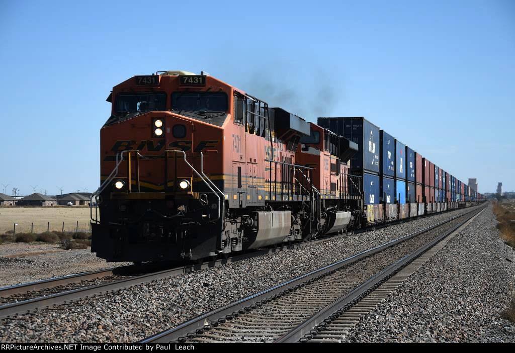 Stack train rolls west